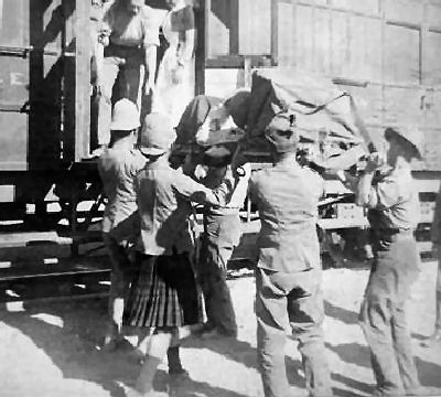 Major Russell and Sister Rose receiving wounded on hospital train at Orange River (1900)