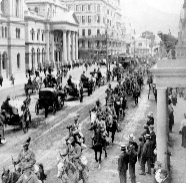 South African Light Horse coming down Alderly Street, Cape Town, to entrain for the front